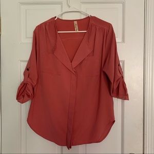 Loose fit blouse with pocket detail